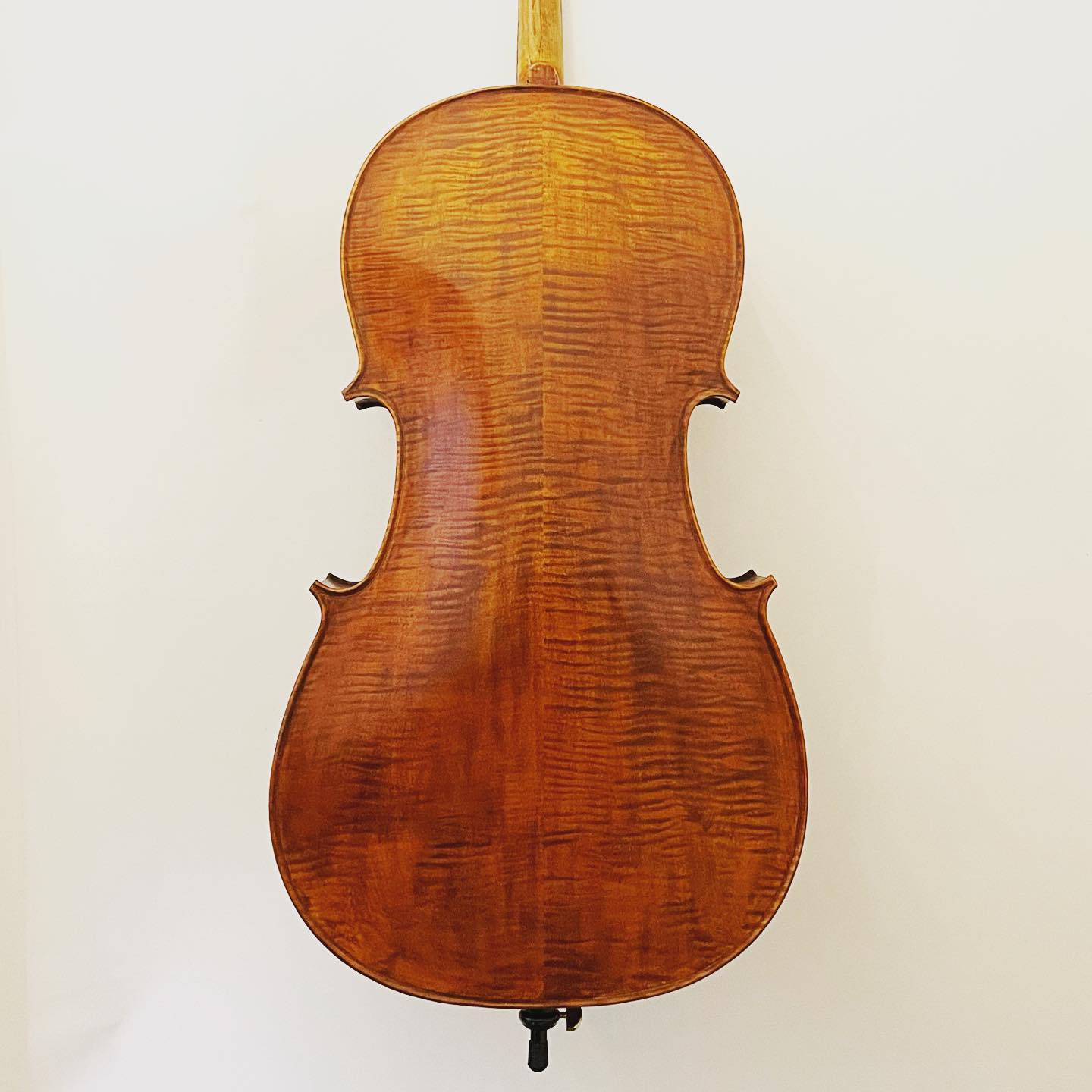 Modern handmade cello labelled 